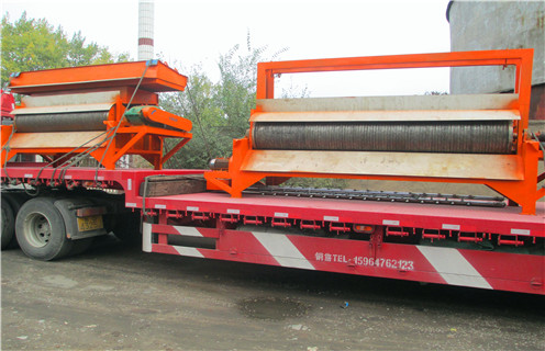 強磁輥式磁選機，上海濕式輥式磁選機工作原理_上海濕式輥式磁選機工作原理如何配置，選三氧化二鐵嗎？